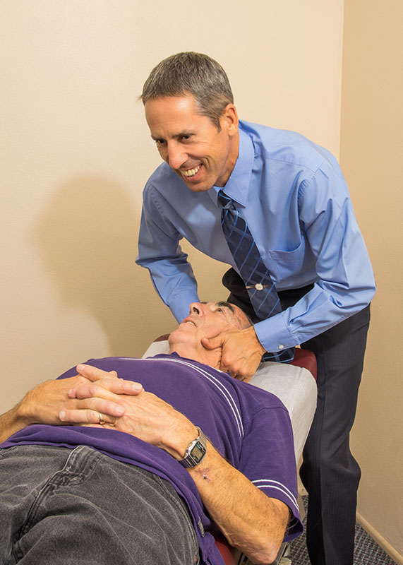 Dr. Bodle performing chiropractic adjustment on patient at Bodle Chiropractic and Integrative Health