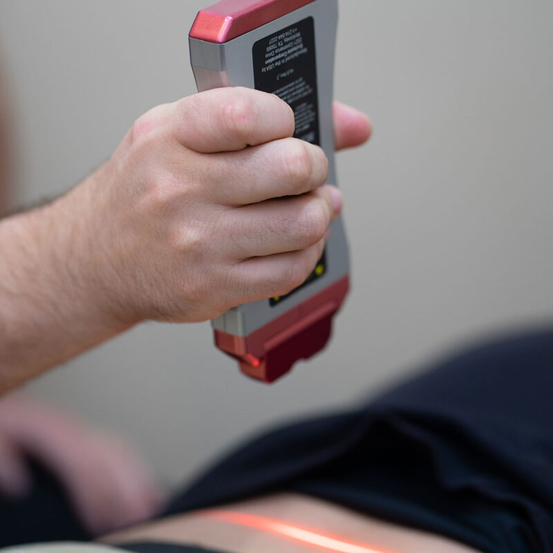 Chiropractor performing Cold Laser Therapy at Bodle Chiropractic and Integrative Health"